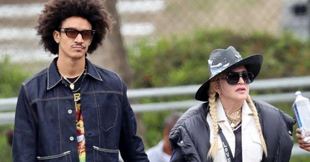 Madonna, 62, holds hands with boyfriend, 27, at son's soccer game, more celeb PDA of 2021 ? Clint Brewer Photography / BACKGRID|Madonna, 62, holds hands with boyfriend, 27, at son's soccer game, more celeb PDA of 2021 ? Clint Brewer Photography / BACKGRID Madonna, 62, holds hands with boyfriend, 27, at son's soccer game, more celeb PDA of 2021 ? Clint Brewer Photography / BACKGRID|Madonna, 62, holds hands with boyfriend, 27, at son's soccer game, more celeb PDA of 2021 ? Clint Brewer Photography / BACKGRID